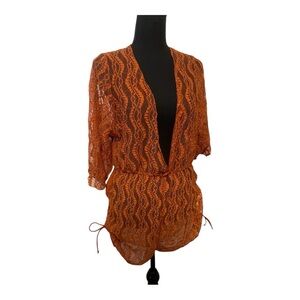 Super cute! Burnt orange lace romper. Medium